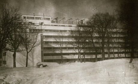 Historic snowy photograph of a modernist concrete building