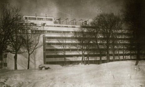 Historic snowy photograph of a modernist concrete building